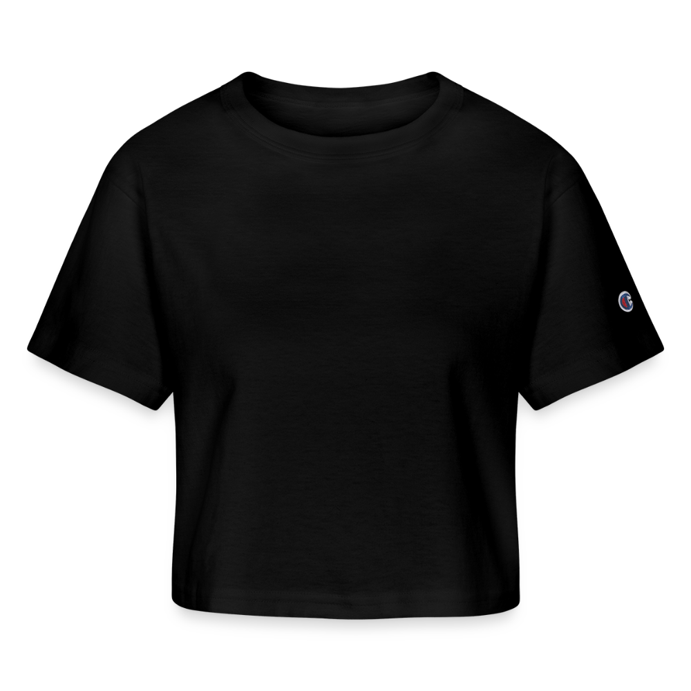 A chic cropped Black T-shirt in a versatile heavyweight 100% cotton fabric (7 oz), featuring stylish oversized sleeves and a slightly cropped cut for a modern look. The shirt includes a 1-inch bound ribbed collar for structure and comfort, with the iconic Champion "C" patch logo on the left sleeve. Perfect for pairing with jeans, skirts, or statement accessories, this effortlessly stylish top is designed to elevate any casual or dressed-up outfit.