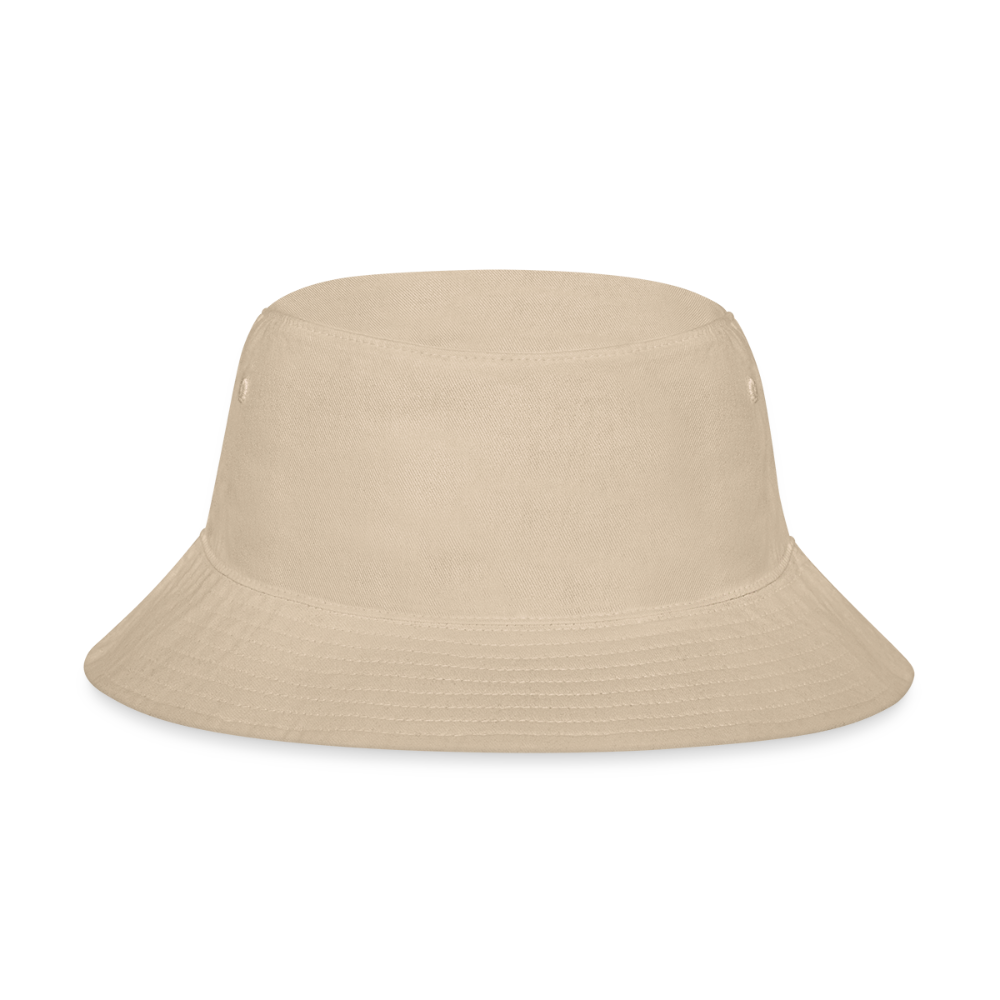 A classic unisex bucket hat in a neutral beige tone, made from 100% soft brushed twill cotton. Features a short, defined brim for sun protection and a relaxed retro silhouette. Includes sewn-in eyelets for breathability, with a "one size fits most" design.