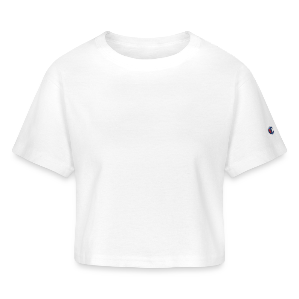 A chic cropped White T-shirt in a versatile heavyweight 100% cotton fabric (7 oz), featuring stylish oversized sleeves and a slightly cropped cut for a modern look. The shirt includes a 1-inch bound ribbed collar for structure and comfort, with the iconic Champion "C" patch logo on the left sleeve. Perfect for pairing with jeans, skirts, or statement accessories, this effortlessly stylish top is designed to elevate any casual or dressed-up outfit. Imported, printed, and processed in the USA.