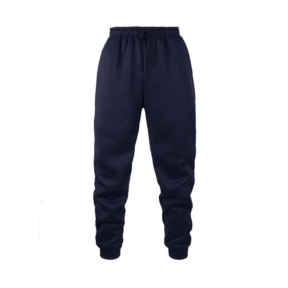 Men's navy fleece jogger sweatpants in soft polyester fabric with an elastic waistband and tapered cuffs. Designed for movement with moisture-wicking performance, ideal for workouts, lounging, or everyday wear.