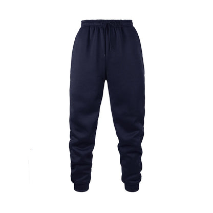 Men's navy fleece jogger sweatpants in soft polyester fabric with an elastic waistband and tapered cuffs. Designed for movement with moisture-wicking performance, ideal for workouts, lounging, or everyday wear.