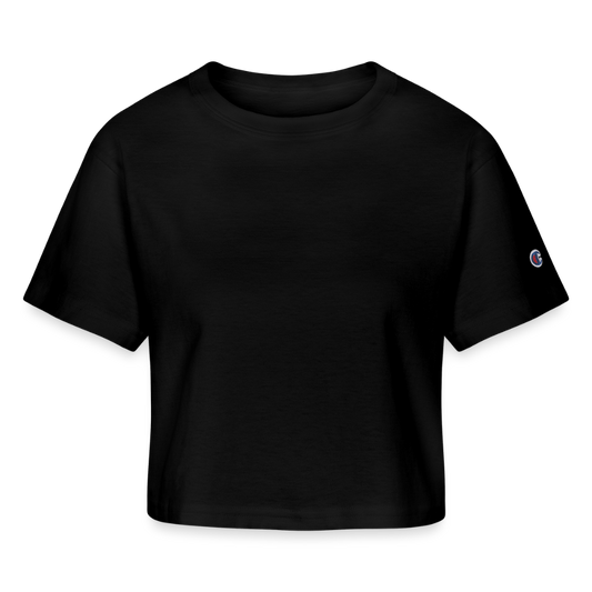 A chic cropped Black T-shirt in a versatile heavyweight 100% cotton fabric (7 oz), featuring stylish oversized sleeves and a slightly cropped cut for a modern look. The shirt includes a 1-inch bound ribbed collar for structure and comfort, with the iconic Champion "C" patch logo on the left sleeve. Perfect for pairing with jeans, skirts, or statement accessories, this effortlessly stylish top is designed to elevate any casual or dressed-up outfit. 