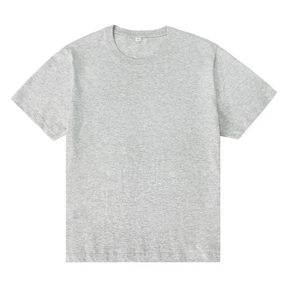Men's essential gray crewneck tee in premium cotton with intentional drape and timeless fit.