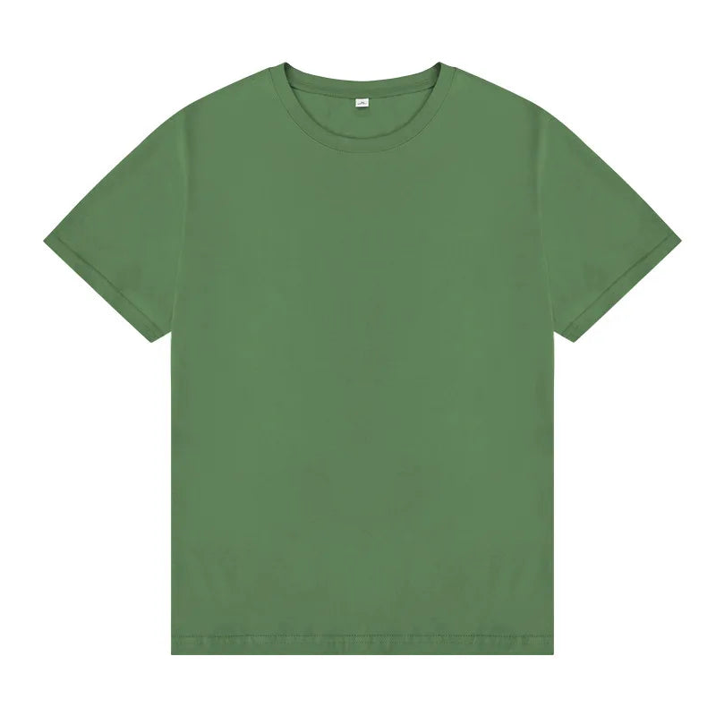 Men's essential green crewneck tee in premium cotton with intentional drape and timeless fit.