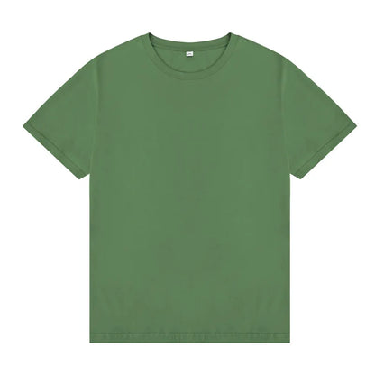 Men's essential green crewneck tee in premium cotton with intentional drape and timeless fit.