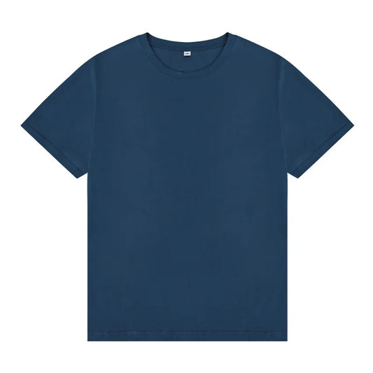 Men's essential navy crewneck tee in premium cotton with intentional drape and timeless fit.