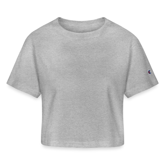 A chic cropped White T-shirt in a versatile heavyweight 100% cotton fabric (7 oz), featuring stylish oversized sleeves and a slightly cropped cut for a modern look. The shirt includes a 1-inch bound ribbed collar for structure and comfort, with the iconic Champion "C" patch logo on the left sleeve. Perfect for pairing with jeans, skirts, or statement accessories, this effortlessly stylish top is designed to elevate any casual or dressed-up outfit. Imported, printed, and processed in the USA.