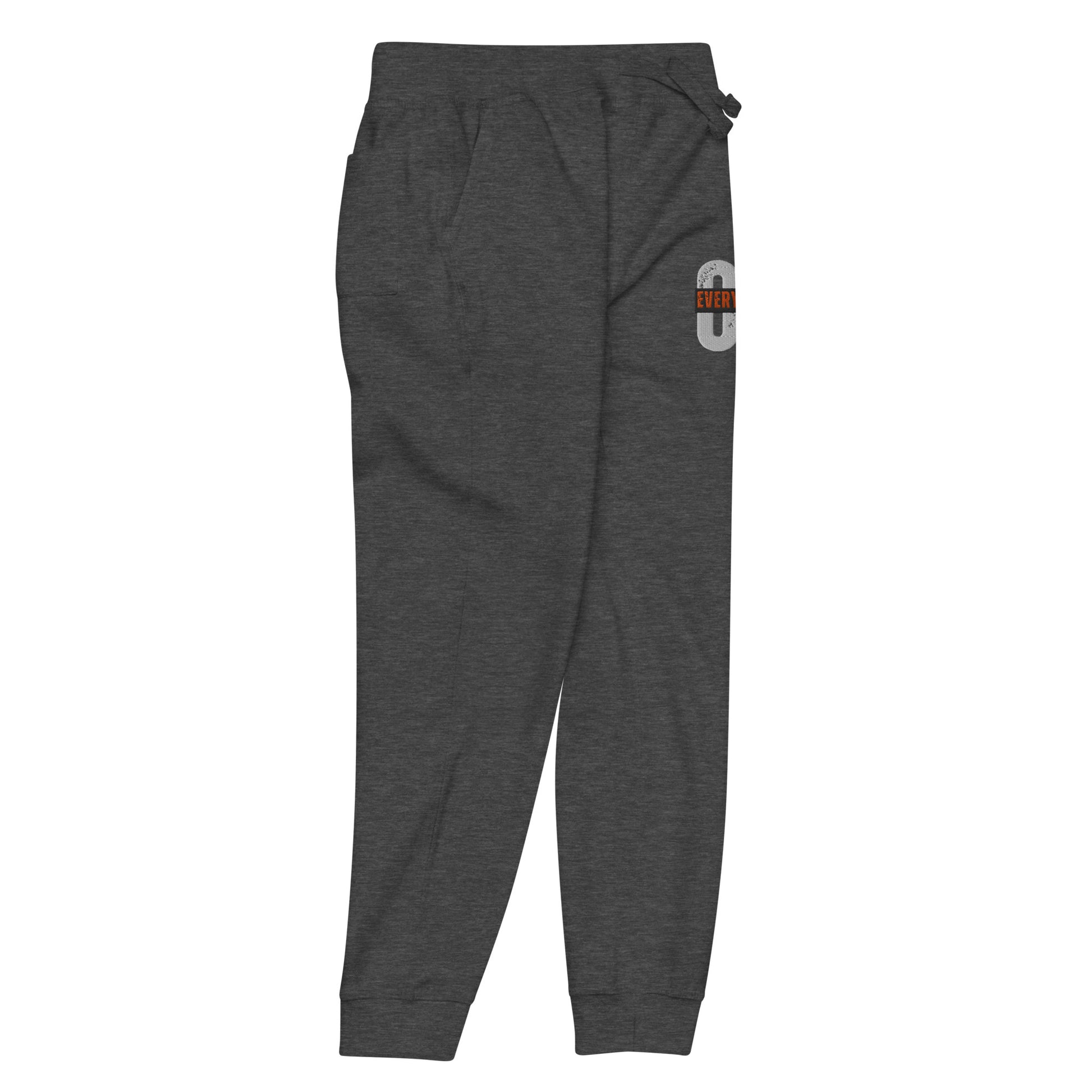 Gray unisex fleece sweatpants with ribbed waistband, cuffed ankles, and front cross pockets. Shown flat to highlight the 5-thread stitching and soft fleece lining. 