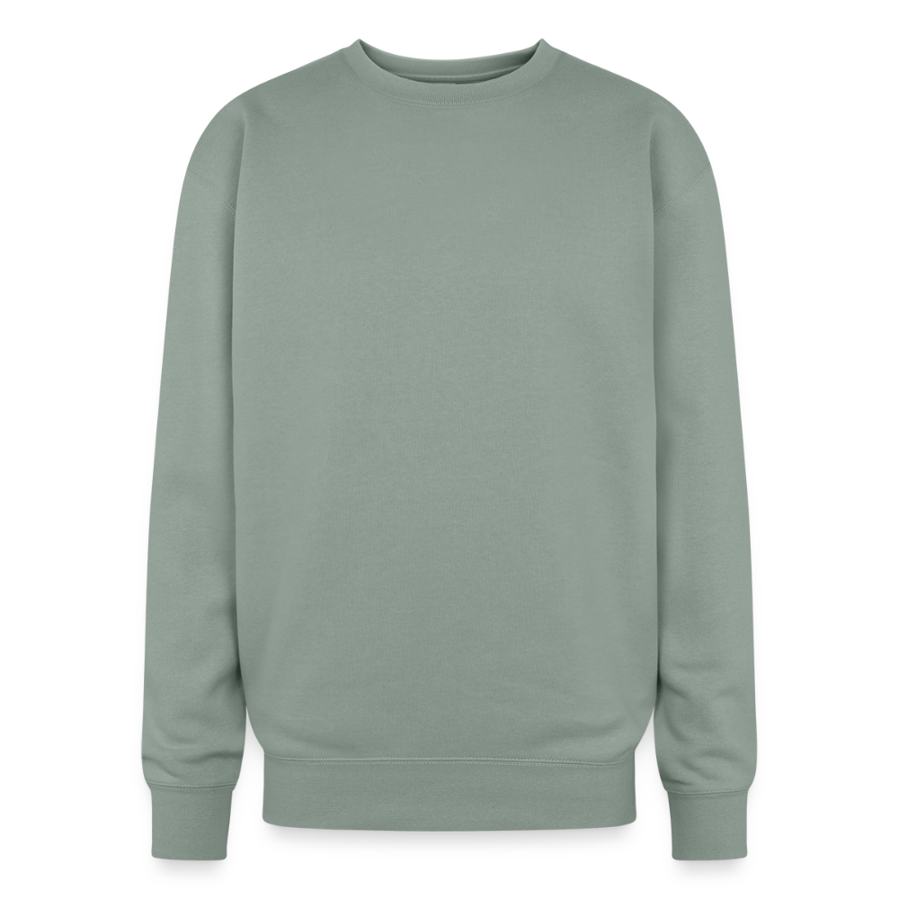 An oversized heavyweight crewneck sage green sweatshirt in a relaxed, generous fit, made from a soft 70/30 ring-spun cotton/polyester blend (10 oz fabric for warmth and durability). The ribbed cuffs and waistband ensure a secure yet relaxed fit, making it ideal for lounging or layering.