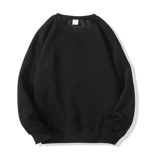 A black classic men's sweatshirt in a relaxed fit, made from a soft cotton-polyester blend. Features a regular-length cut, full sleeves, and a versatile crew neck collar, perfect for layering or wearing solo.