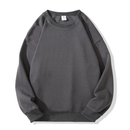 A gray classic men's sweatshirt in a relaxed fit, made from a soft cotton-polyester blend. Features a regular-length cut, full sleeves, and a versatile crew neck collar, perfect for layering or wearing solo.