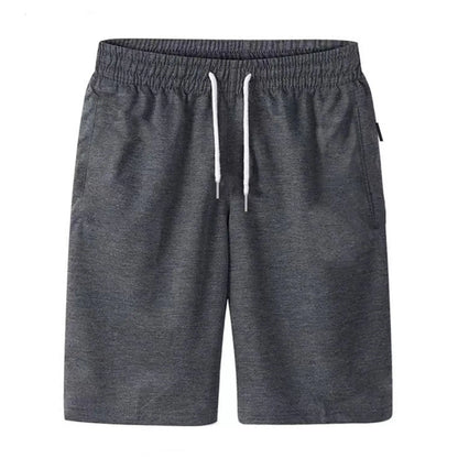Men's slim-fit casual shorts in a lightweight cotton blend fabric, featuring a tailored silhouette with side pockets and back welt pockets. The elastic waistband with adjustable drawstring offers a secure fit, ideal for warm-weather comfort and everyday wear.
