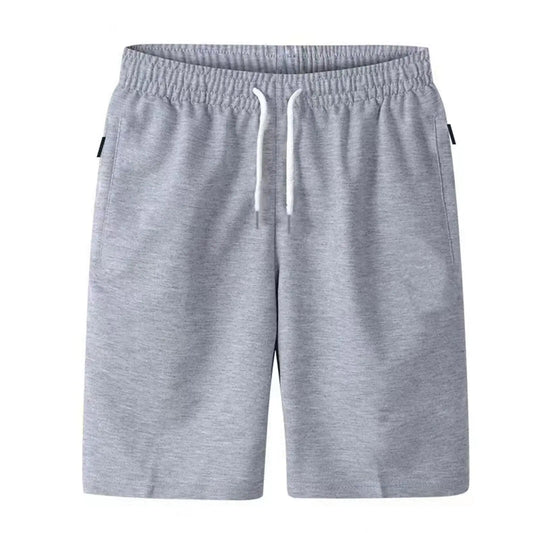 Men's slim-fit casual shorts in a lightweight cotton blend fabric, featuring a tailored silhouette with side pockets and back welt pockets. The elastic waistband with adjustable drawstring offers a secure fit, ideal for warm-weather comfort and everyday wear.