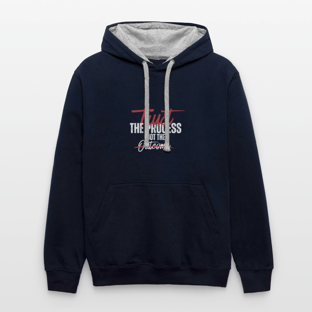 A unisex navy/gray contrast hoodie featuring a double-layered hood with a bold contrasting inner fabric and matching flat lace drawcords. The front displays a motivational print reading "Trust the Process Not the Outcome" in a clean, modern font. Made from a soft 80% cotton/20% polyester blend (8.3 oz midweight fabric), it has ribbed cuffs and hem for a snug fit. Designed for tag-free comfort with a tear-out label, this stylish pullover by ADON LUXE is perfect for everyday wear. 