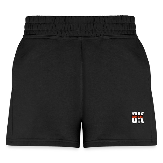 Women’s black jogger shorts with an elastic waistband and side pockets, featuring an ‘Everything Will Be OK’ print along the hem. Shown flat to highlight the lightweight fabric and relaxed fit.