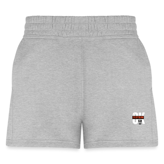 Women’s gray jogger shorts with an elastic waistband and side pockets, featuring an ‘Everything Will Be OK’ print along the hem. Shown flat to highlight the lightweight fabric and relaxed fit.